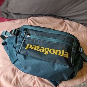Patagonia Blue Belt Bag with Yellow Logo